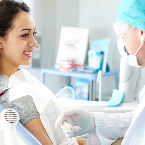 Dentist in Mississauga discussing Dental services during consultation